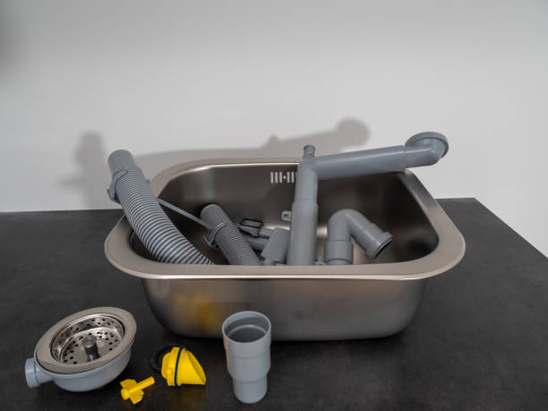 istock The kitchen sink fittings are ready to be installed next to the sink on the kitchen worktop. 1495586550