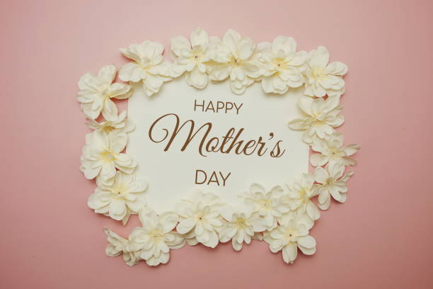istock Happy Mother's Day card typography text with flower on pink background 1495589339