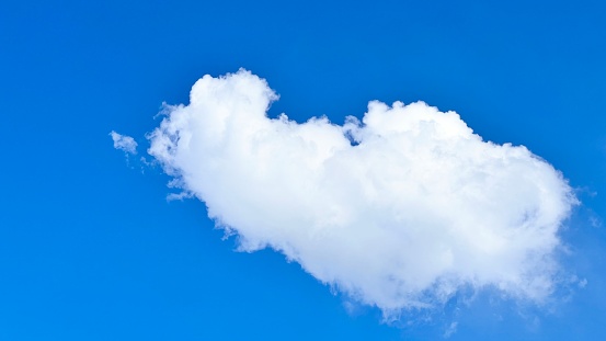 Beautiful blue sky and white fluffy cloud background