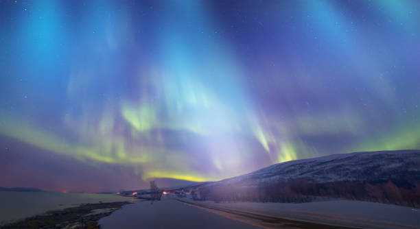 istock Northern lights (Aurora borealis) in the sky over Tromso, Norway 1495600940