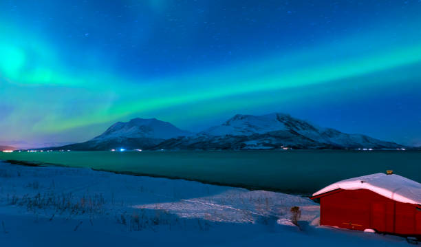istock Northern lights (Aurora borealis) in the sky over Tromso, Norway 1495601251