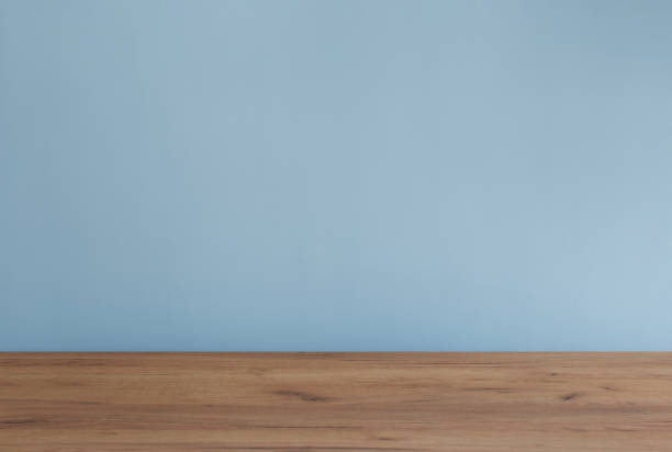 istock background with modern wooden table and blue  wall 1495602667