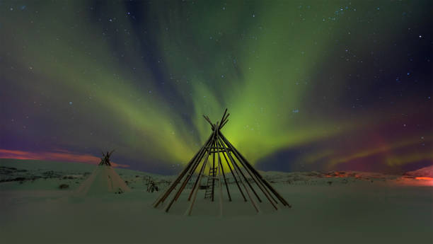 istock Northern lights (Aurora borealis) in the sky over Tromso, Norway 1495602974