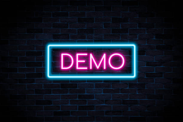 istock Demo neon banner on brick wall background. 1495605424