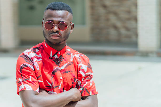 istock Black skinned man with red colored sunglasses 1495608438