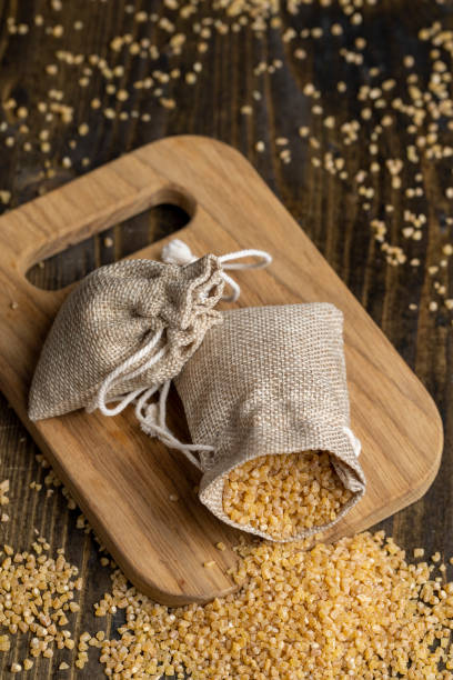 istock Not cooked wheat porridge in a linen bag 1495621172