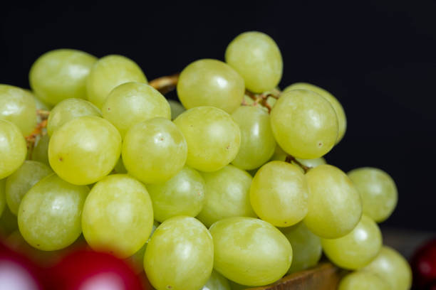 Large ripe grapes on the table , sweet grapes for dessert