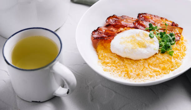 istock breakfast barley porridge with bacon and a poached egg 1495622845