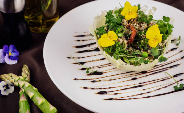 Couscous salad with asparagus on white plate
