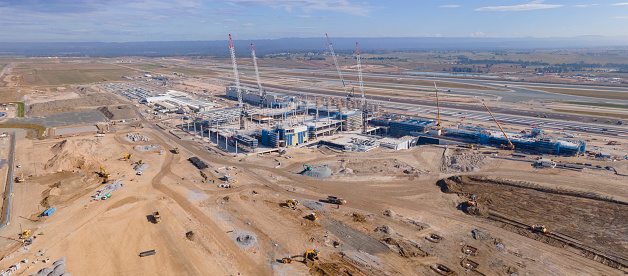 Panoramic aerial drone view of the runway at the construction site of the new International Airport at Badgerys Creek in Western Sydney, NSW, Australia in June 2023