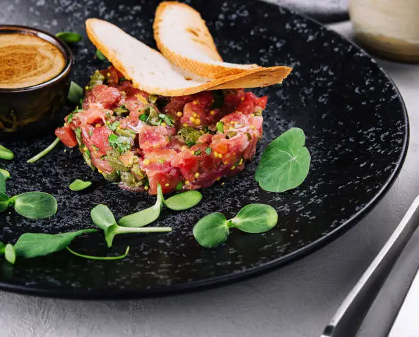 Raw beef tartar snack with capers