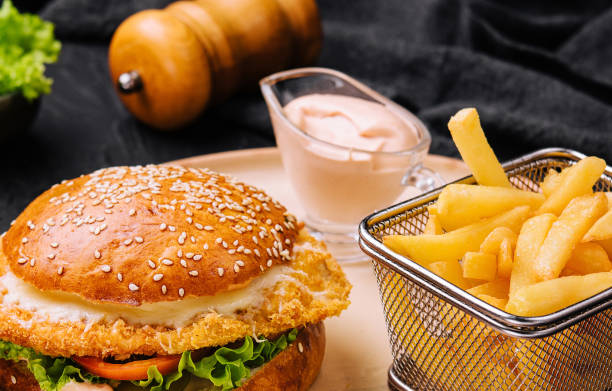 istock Fried chicken burger - unhealthy food style 1495624442