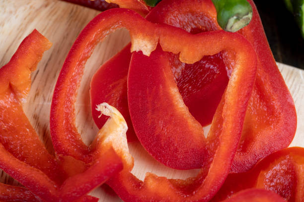 istock red sweet pepper on the kitchen board, cooking 1495626626