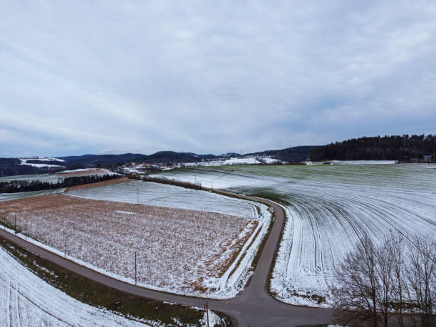 istock snow-covered agricultural fields in bavaria on a cloudy 1495631533