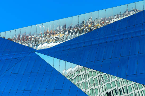istock Reflections in an office building with a glass facade 1495634025