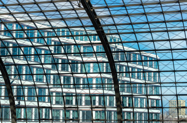 Modern office building behind a glass grid, Berlin Hauptbahnhof
