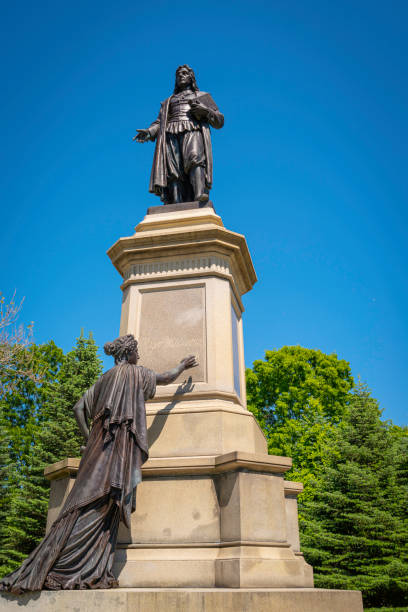 istock Roger Williams statue against a clear blue sky in Roger Williams park 1495636544
