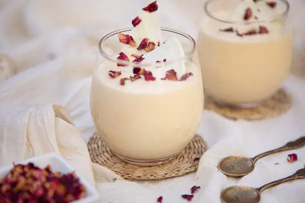 Photo of White chocolate mousse with rose petals