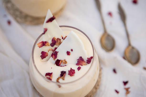 istock White chocolate mousse with rose petals 1495638690