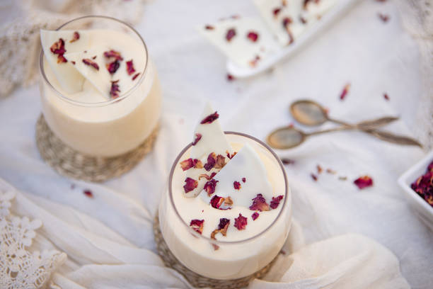 istock White chocolate mousse with rose petals 1495638725