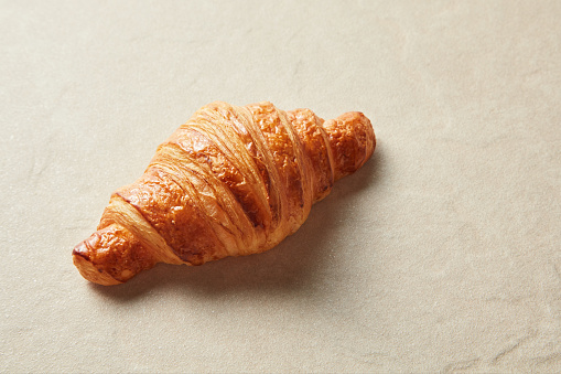 Croissant Over Stone Background