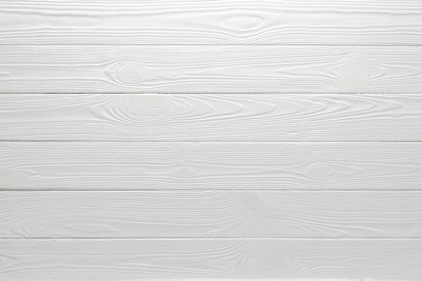 White wood table background, top view. Textured painted floor, board texture, wooden siding. Light gray horizontal planks, grey empty slats. Timber panel surface. Natural materials.