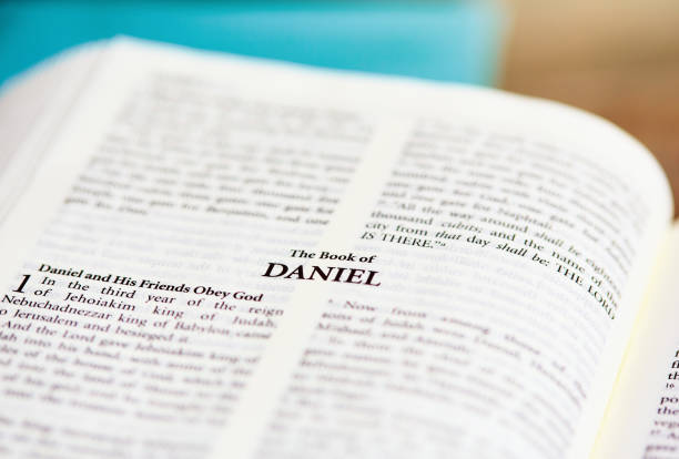 istock Bible open to the Book of Daniel 1495647819