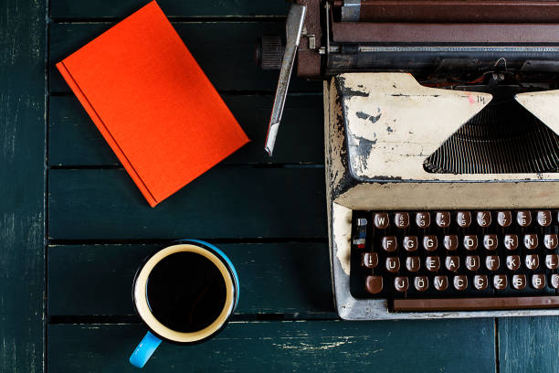 istock Coffee with vintage tyepwritertop view 1495653121