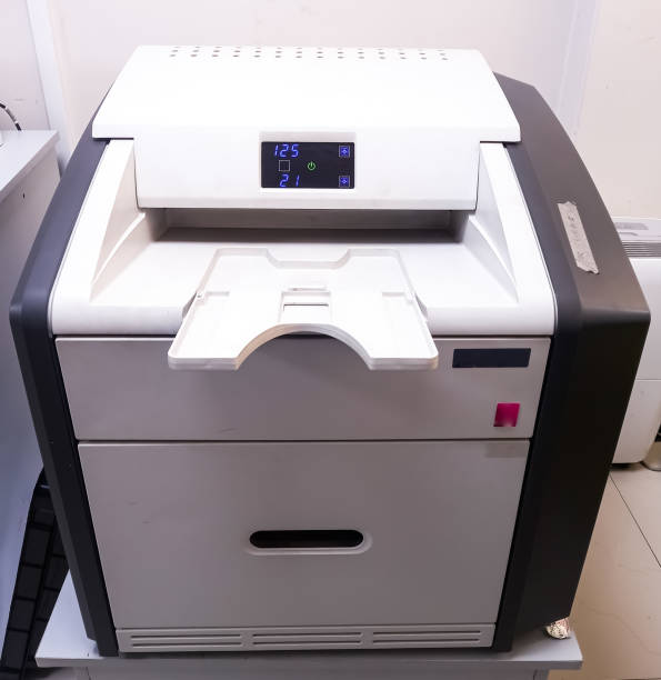 Laser printer in office, CT, MRI, CR, DR Mammography Printer, laser imaging technology, tabletop printing convenience and built-in mammography capabilities.