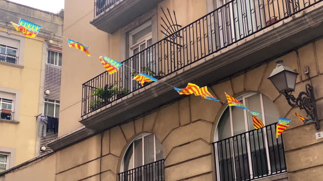 Valencian flags hanging in the street