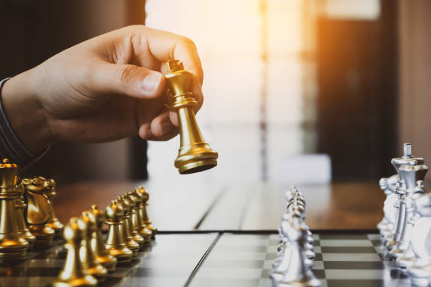 istock Businessman moving chess
ideas concept Plan leading strategy of successful competition. 1495656781