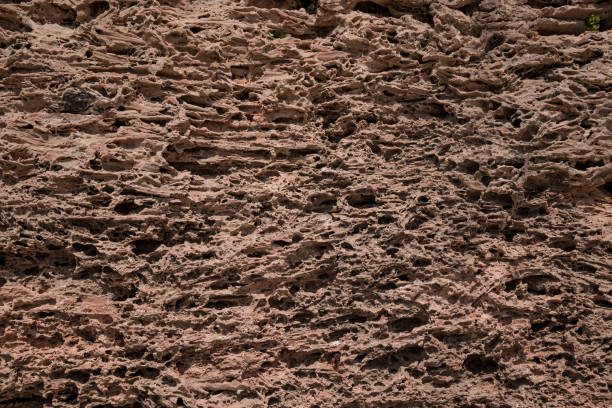 istock Old and weathered grungy yellow  pattern texture wall background 1495658824