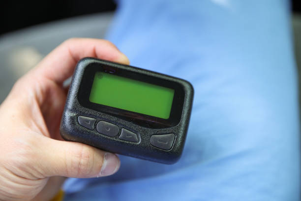 istock Beeper pager symbolizes communication, urgency, and efficiency in business and hospital settings. It represents the need for immediate response and coordination in professional environments 1495663448