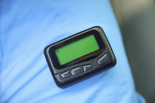 istock Beeper pager symbolizes communication, urgency, and efficiency in business and hospital settings. It represents the need for immediate response and coordination in professional environments 1495663449