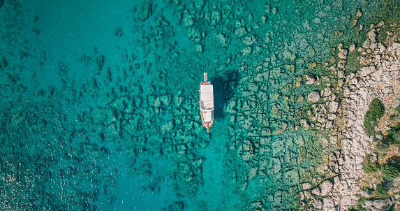 Kekova, also named Caravola, is a small Turkish island near Demre (Demre is the Lycian town of Myra) district of Antalya province which faces the villages of Kaleköy (ancient Simena) and Üçağız (ancient Teimioussa). Kekova has an area of 4.5 km2 (2 sq mi) and is uninhabited.