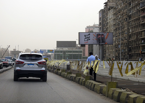 Cairo, Egypt, May 21 2023:  The 15th of May bridge development project includes expansion and upgrading works that is under construction to increase the bridge's width, May 15 bridge pass over Nile, selective focus