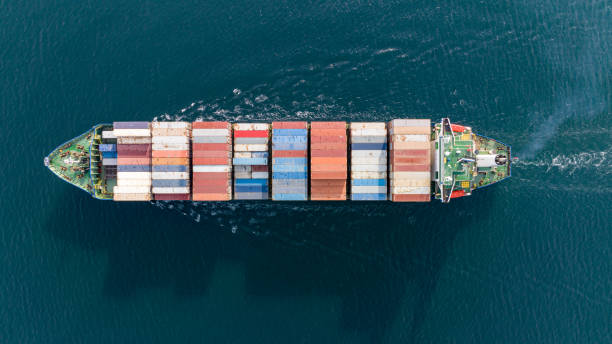 istock Large container ship at sea. Aerial view of cargo container ship vessel import export container sailing. 1495687280