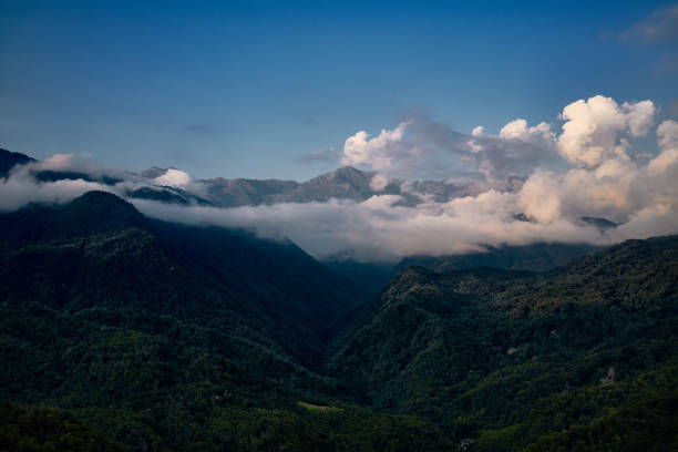 istock Mountain ranges on a sunny day at Georgia. Sky with clouds adn hills 1495694352