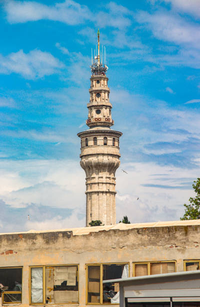 istock Tower and houses 1495696309