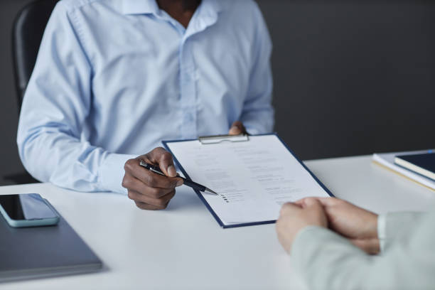 istock HR recruiter reviewing CV in job interview 1495696937