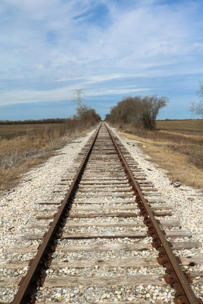 istock rails disappearing on the road to nowhere 1495699072