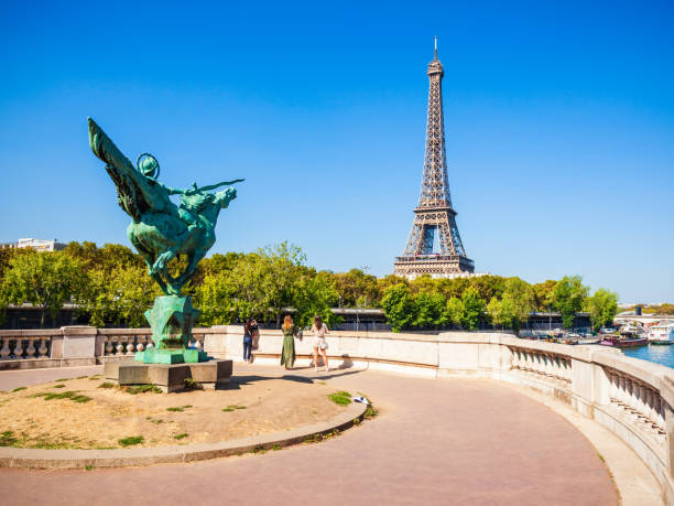 Eiffel Tower in Paris, France Eiffel Tower or Tour Eiffel is a wrought iron lattice tower on the Champ de Mars in Paris, France named animal stock pictures, royalty-free photos & images