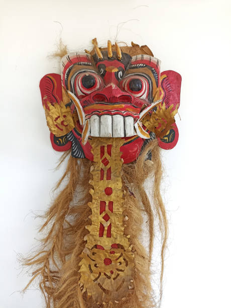 istock Balinese Barong Mask hanging on white wall background. 1495707963