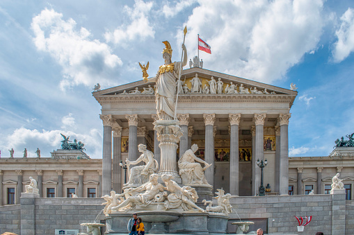 vienna, austria. 1 may 2023 goddess of wisdom the pallas-athene fountain and the austrian parliament building