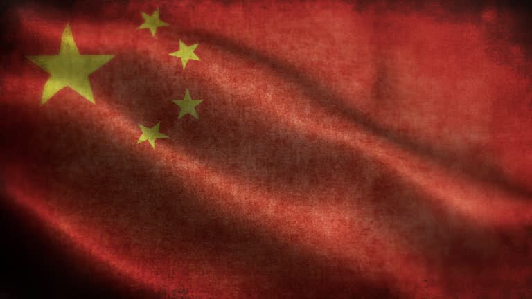 Closeup of grunge China waving flag loopable stock video