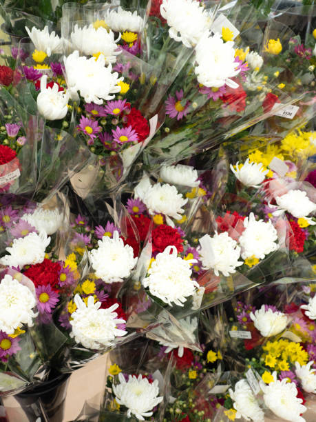 istock Cut flowers for Buddhist altars lined up at the store 1495723547
