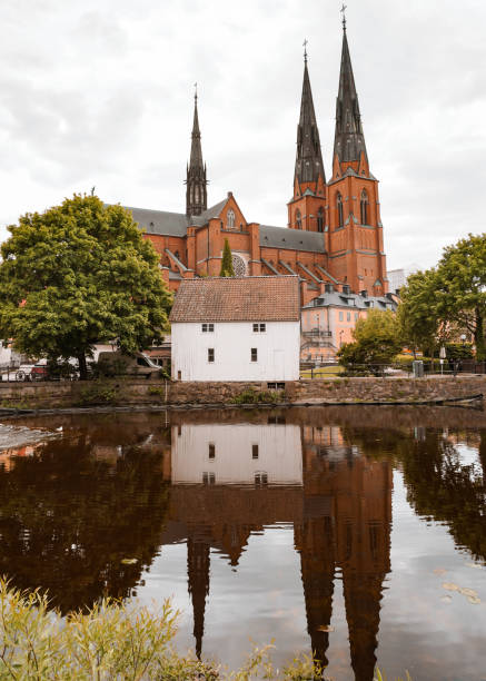 istock View of cathedral by river against sky 1495728198