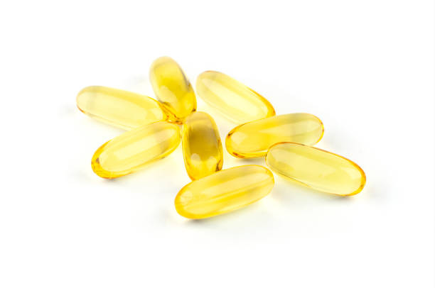 istock Isolated fish oil capsules. Omega 3. 1495732114