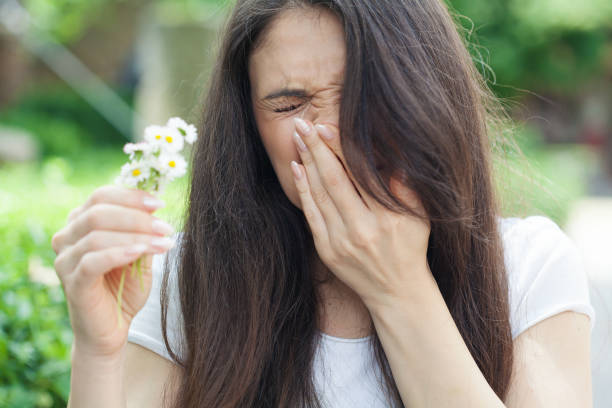 istock Young woman suffering from spring allergies 1495732373