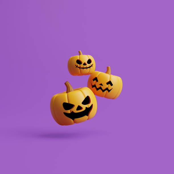 istock Jack-o-Lantern pumpkins floating on purple background 1495733599